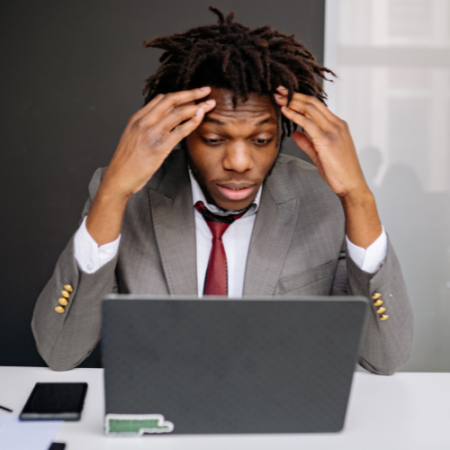 Frustrated man at computer